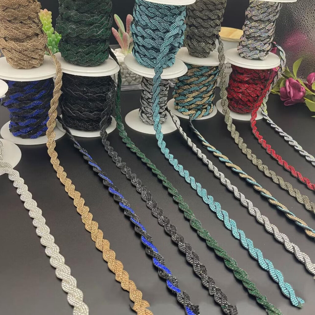 Detail shot of a crystal cord drawstring, showing the secure setting of each sparkling rhinestone along the flexible rope.