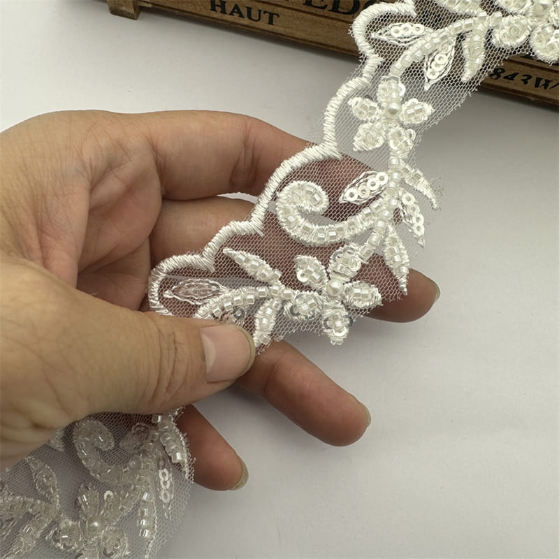 Handmade bridal beaded lace trim with pearls and sequins on mesh base
